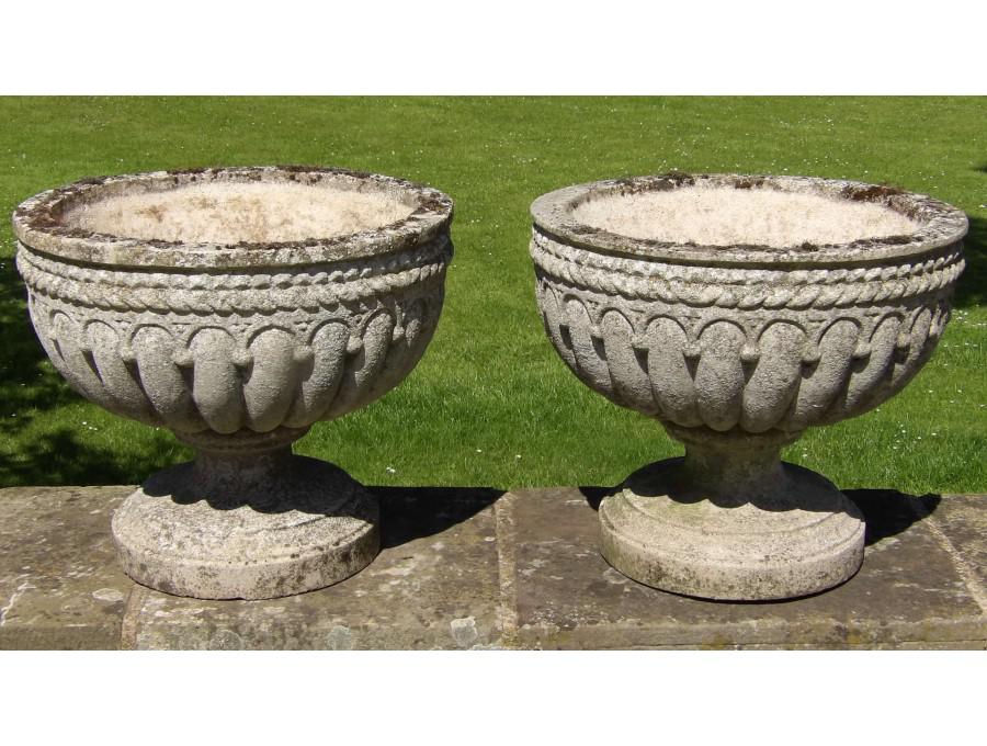 Pair of Weathered Stone Urns