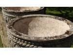 Pair of Weathered Stone Urns