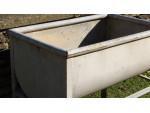 A vintage galvanised trough on stand