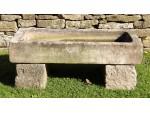 Old stone sink on blocks