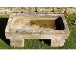 Old stone sink on blocks
