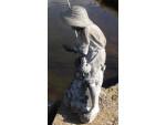 Side view of lead garden figure