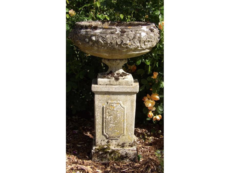 A Weathered Garden Urn on Plinth