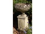 A Weathered Garden Urn on Plinth