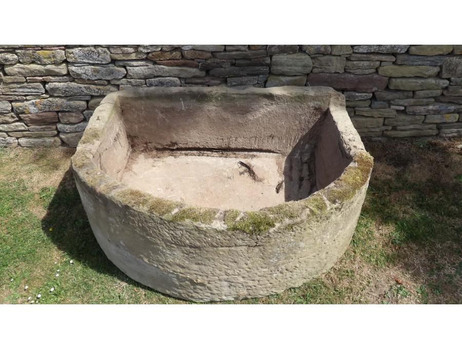A Large Bow Fronted Stone Trough