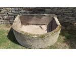 A Large Bow Fronted Stone Trough