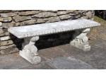 Side on view of stone garden bench 