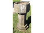 Side view of stone font 