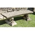 Side view of vintage stone bench 