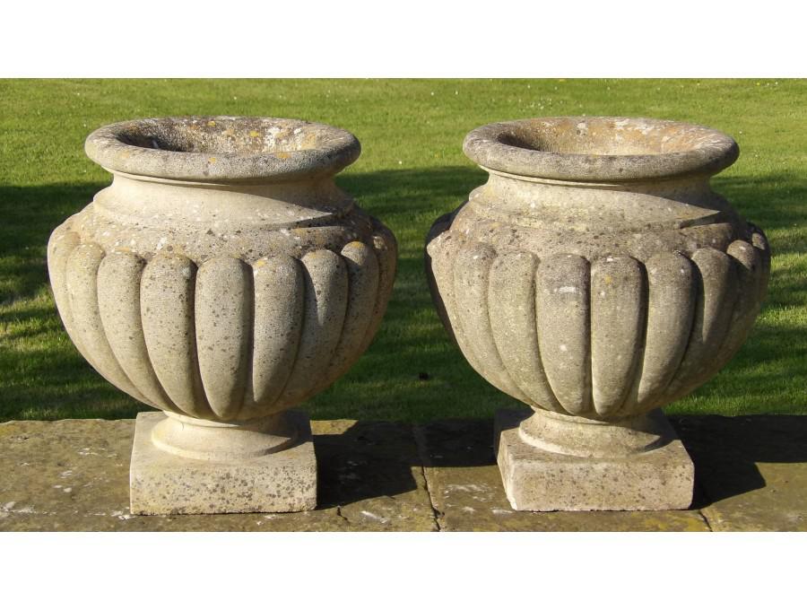 A Pair of Weathered Garden Urns