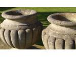 A Pair of Weathered Garden Urns