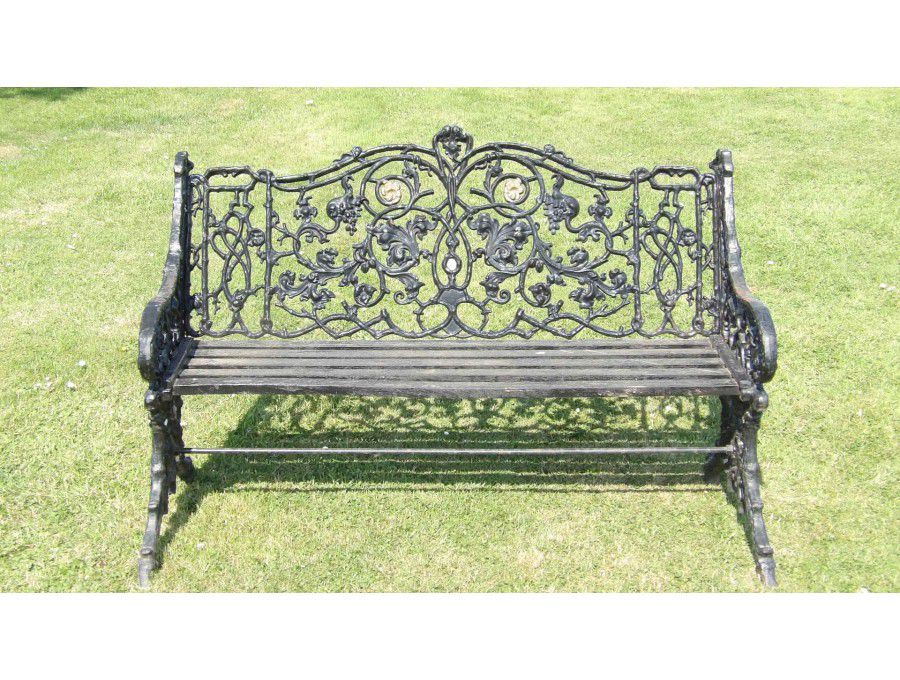 Face on view of vintage cast-iron bench 