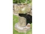 Side view of stone font 