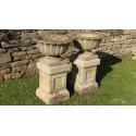 Side view of pair of urns 