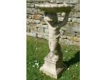 Side on view of birdbath