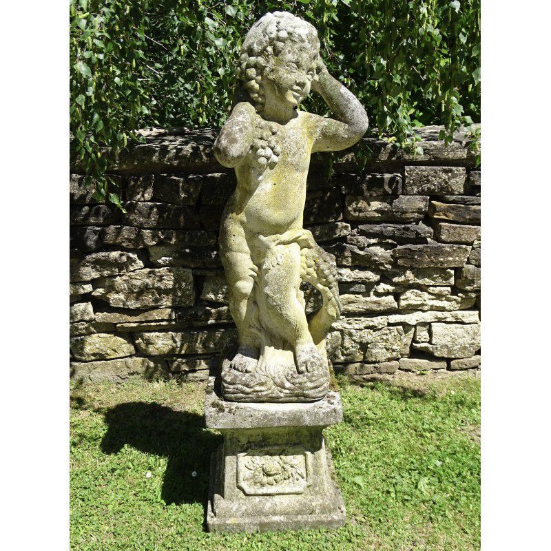 Weathered Statue of Bacchus