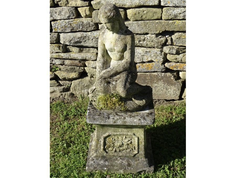 Weathered Garden Statue