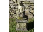 Weathered Garden Statue