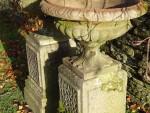 Weathered Urns on Plinths (Pair)