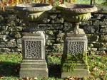 Weathered Urns on Plinths (Pair)
