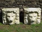 Carved Stone Lion Masks (Two)