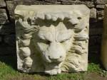Carved Stone Lion Masks (Two)