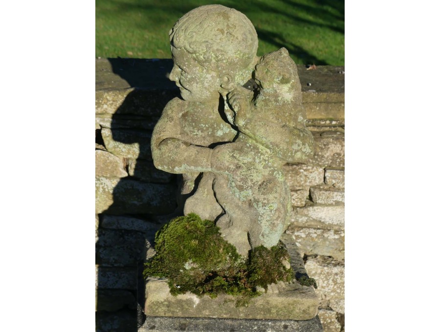 Boy with Cat Stone Statue