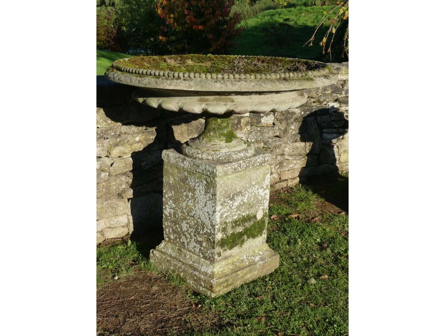 Large Weathered Urn on Plinth