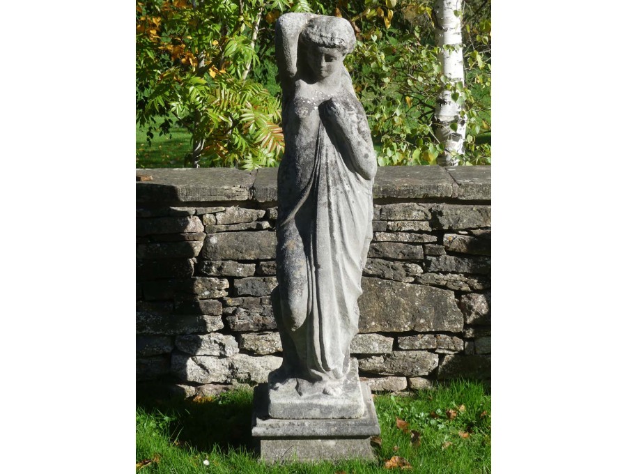 Weathered Chilstone Garden Statue